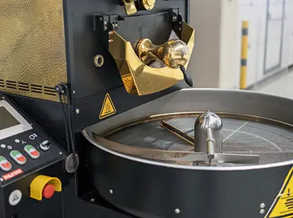 Close-up of food mixing equipment in processing facility