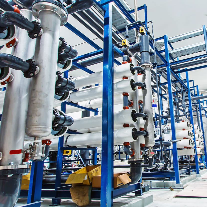 Reverse osmosis water treatment system with multiple membrane filtration units and industrial piping for fluid processing