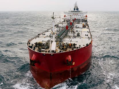 Marine vessel docked at port for transportation solutions