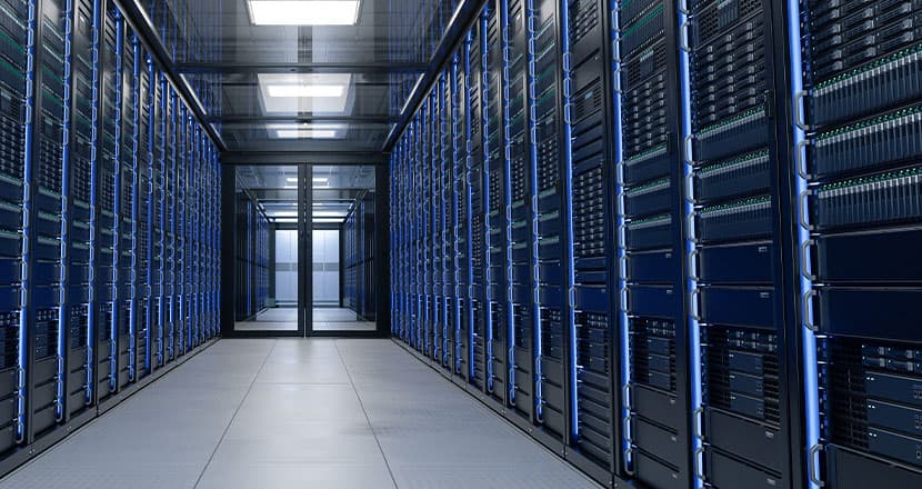 Interior view of a modern data center with rows of server racks