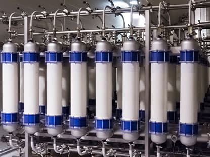 Interior view of water treatment facility with filtration systems